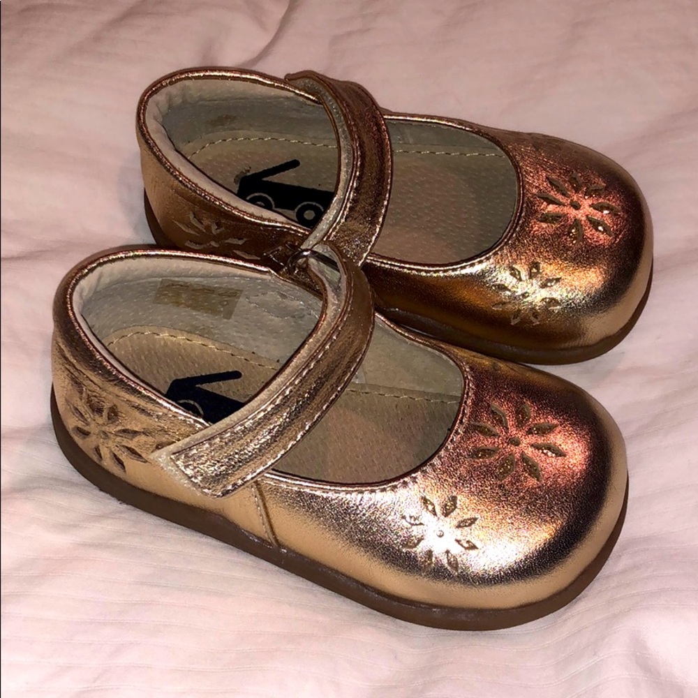See Kai Run gold toddler shoes!
